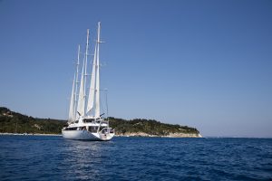 Boat sailing by the Ionian Islands, Greece
